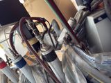a bunch of hoses that are connected to a water heater