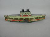 a toy boat that is sitting on a table
