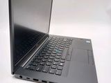 a laptop computer sitting on a table with a white background