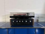 a radio that is sitting on top of a blue table
