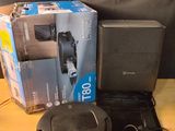 a box of electronics on a table next to a laptop