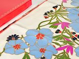 an image of a table cloth with a book on it