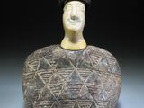 an image of a statue of a man with a hat on his head