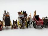 many different types of toy trains on a white surface