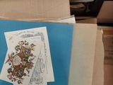 a pile of boxes with a bunch of cards on them