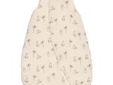 the baby sleeping bag is made of cotton and has palm trees on it