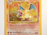 a close up of a pokemon card on a white surface
