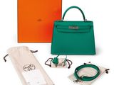a green and orange handbag, bracelets, and a bag