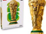 a lego sculpture of a soccer trophy in front of a box of legos