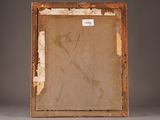 an old picture frame with a piece of paper in it