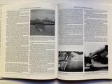 an open book with pictures of airplanes on it