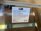 a picture of a sign on a glass door that says l2g