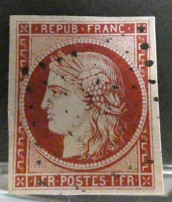 an image of a stamp with a woman ' s head on it