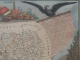 a bird that is sitting on top of a map