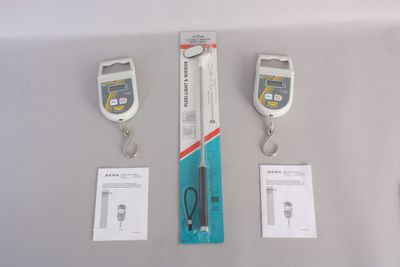 three electronic devices that are sitting on a table