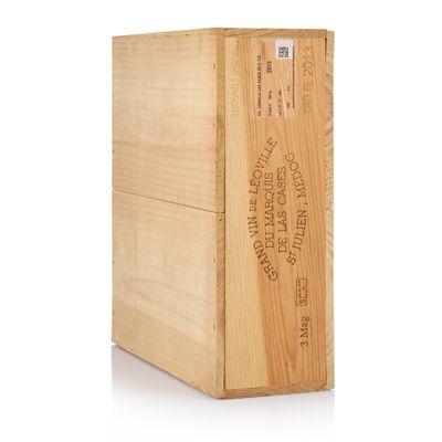 the wooden box is empty and ready to be used as a wine box