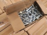 a box with a bunch of screws inside of it