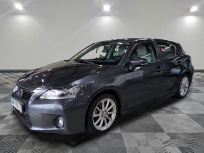 a picture of a dark colored car in a room