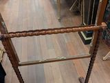 a mirror that is on a stand in a room