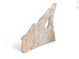 a marble sculpture of a rock with a hole in it
