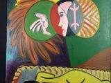 une image représentant un tableau où l'on voit une femme et un homme allongés sur un lit