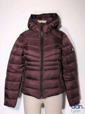 the jacket is maroon and has a hood on it