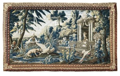 a close up of a tapestry hanging on a wall