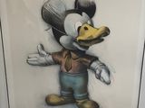 walt ' s mickey mouse art print in a frame on a wall