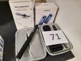 une boîte contenant un téléphone fixe et un téléphone portable