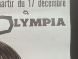 a poster with a picture of a young boy on it