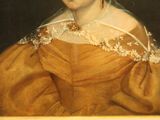 portrait of a woman in a brown dress with a tiable