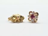 paire de boucles d'oreilles à clous en rubis et diamants