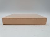 a cardboard box that is sitting on a white surface