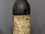 a bottle of wine that is sitting on a table