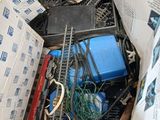 a pile of assorted items sitting on the floor