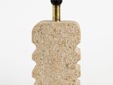 an image of a stone bottle with a cork stopper on it