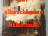 a book with a picture of a factory with smoke coming out of it