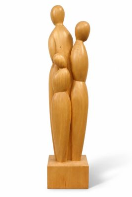 wooden sculpture of a family of three sitting on top of a wooden base