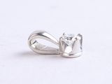 silver pendant with a square cut diamond on a white background