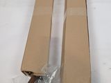 two pieces of cardboard sitting on top of a table