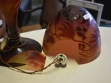 two vases that are sitting on a table