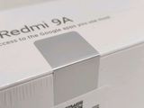 the back of a white box with a qr code on it