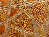 a close up picture of a decorative design on a wall