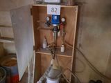 a picture of a room with a shelf and a water heater