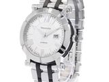 a close up of a watch with a white face and black stripes