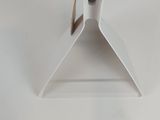 a white object on a white table with a white background
