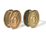 pair of brass plated cufflinks with a man and woman on them