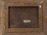 an old picture frame with a piece of paper taped to it