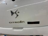 a close up of a white car with a citroen logo on it