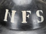 a close up of a helmet with the word n f s written on it